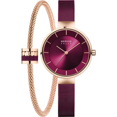 BERING - Montre solaire pour femme en acier inoxydable de 31 mm en or rose/violet